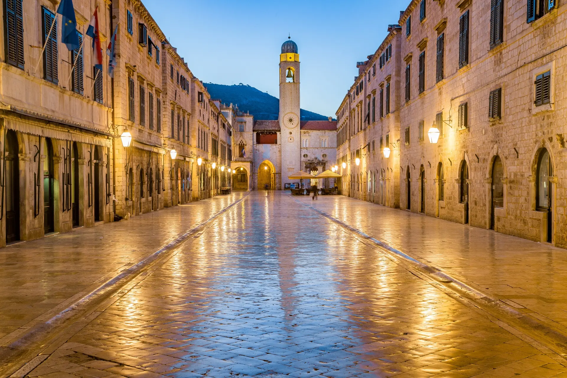 stradun in dubrovnik croatia before night, warm lights